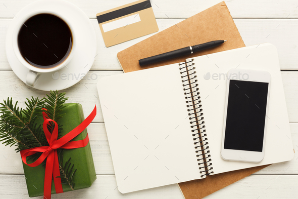 Christmas wish list on wood table background - Stock Photo - Images