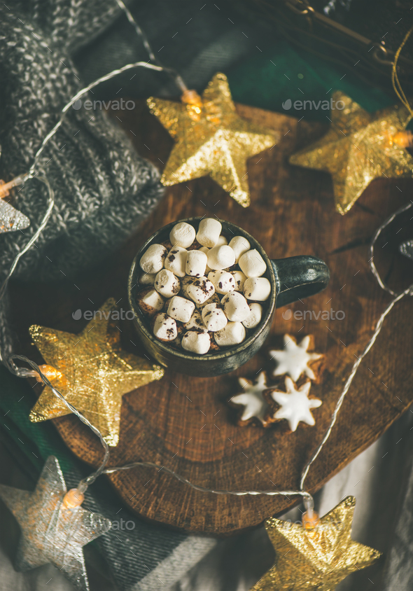 Christmas winter hot chocolate with marshmellows over wooden board - Stock Photo - Images