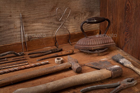 Collection of vintage tools on a blue wooden background - Stock Photo - Images