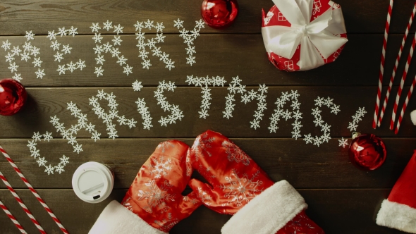 Santa Claus Drinks Tea By New Year Wooden Table, Top Down Shot