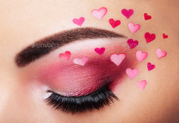 Eye make-up girl with a heart - Stock Photo - Images