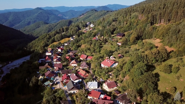 Flying over Village Spania Dolina in Slovakia alt