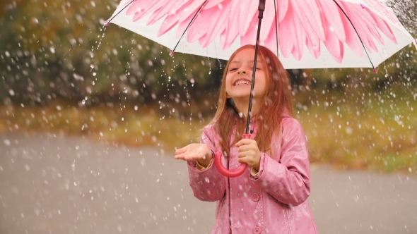 Cheerful Girl With Umbrella Under Rain