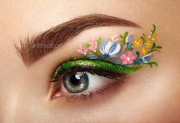 Eye makeup girl with a flowers - Stock Photo - Images
