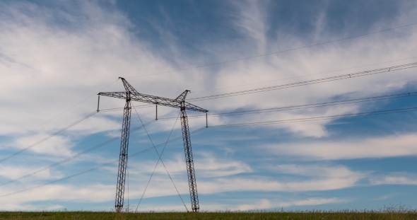 Cloudy Morning Sky and a High-voltage Line