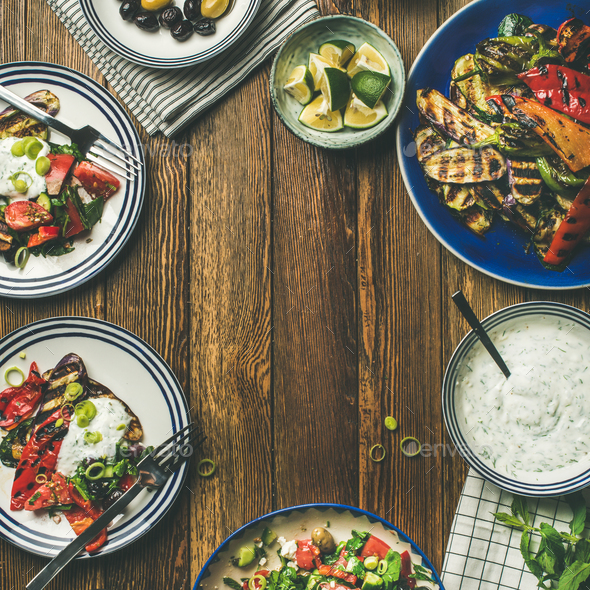 Flat-lay of healthy dinner table setting with snacks , square crop - Stock Photo - Images