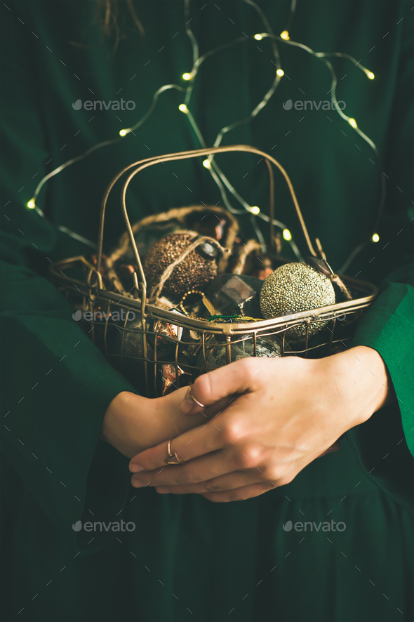 Christmas, New Year tree vintage toys in hands of woman - Stock Photo - Images