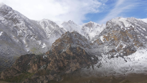 Dolomite Rocks Powdered with Snow