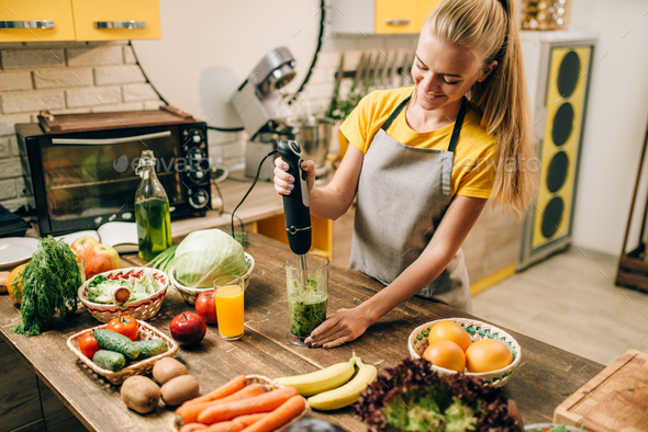 Female person cooking, mixing healthy organic food - Stock Photo - Images