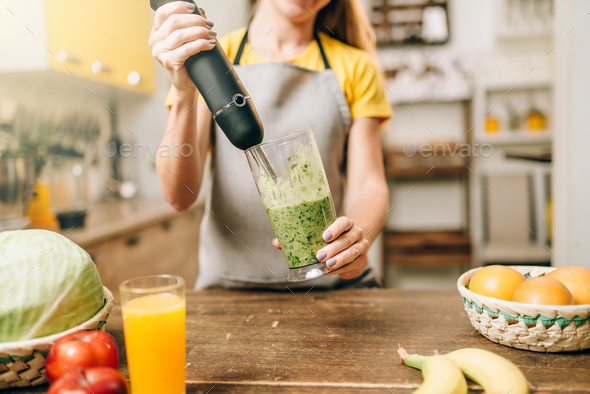 Female person cooking, mixing healthy organic food - Stock Photo - Images
