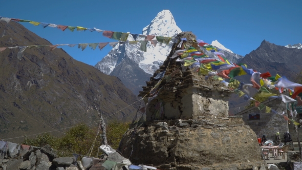 Buddhist Stupa and Snow Mountain alt