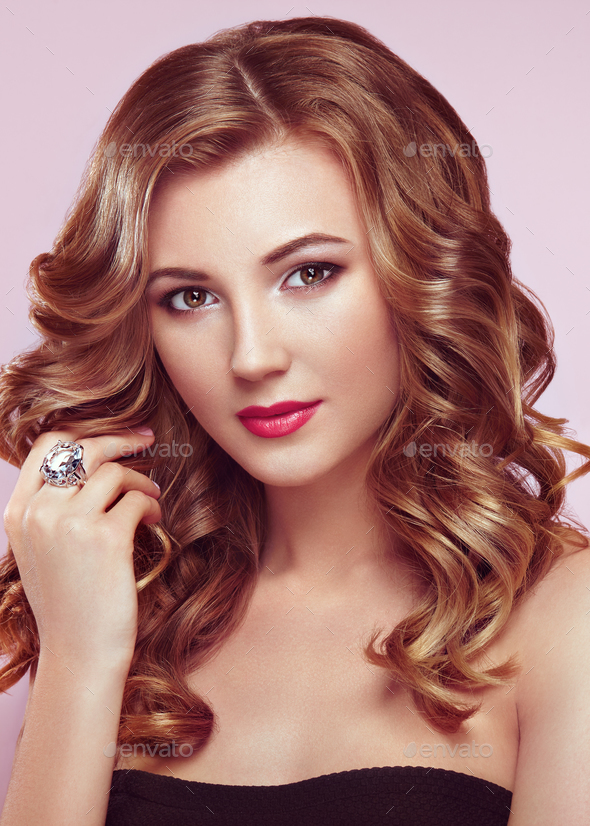 Blonde woman with long shiny wavy hair - Stock Photo - Images