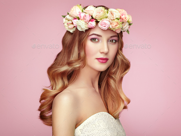 Beautiful blonde woman with flower wreath on her head - Stock Photo - Images