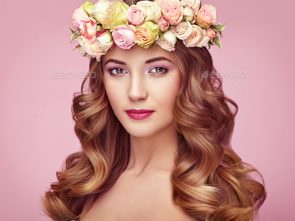 Beautiful blonde woman with flower wreath on her head - Stock Photo - Images
