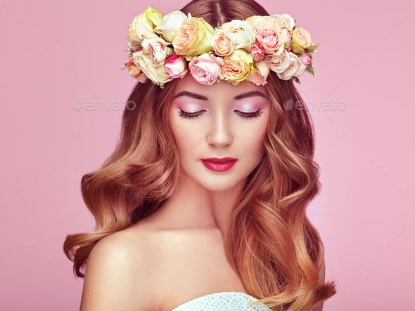 Beautiful blonde woman with flower wreath on her head - Stock Photo - Images