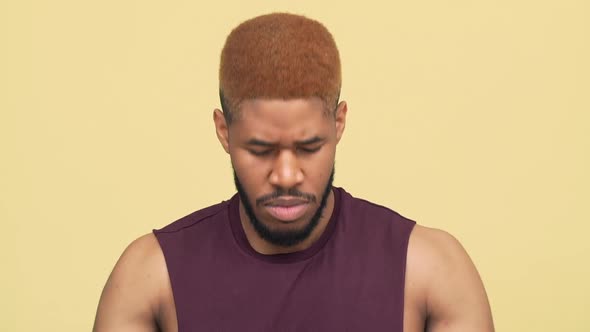 Sporty Metis Guy with Stylish Haircut Wearing Workout Clothes Taking Break After Training Putting alt