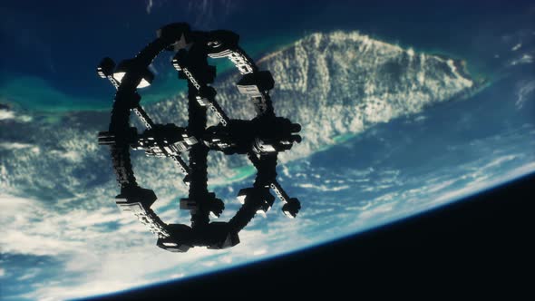 Space Ship Orbiting the Earth Elements of This Image Furnished By NASA alt