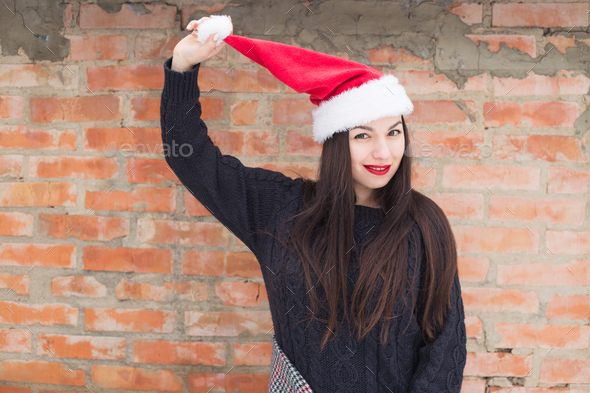 Carefree girl, laughing on a winter day. Outdoor photo of young european woman cheating Stock Photo by ollinka