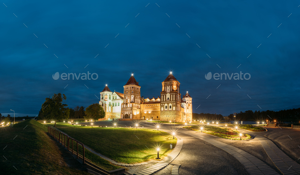 Mir, Belarus. Mir Castle Complex In Evening Illumination Lightin - Stock Photo - Images