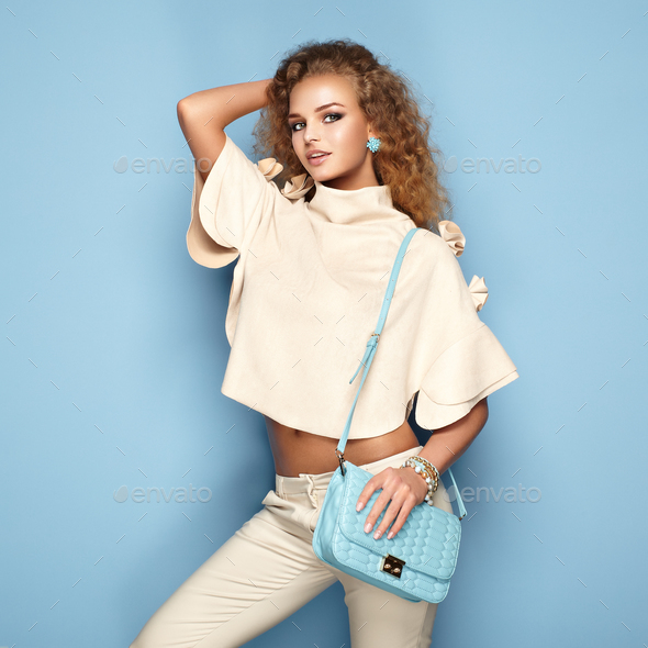 Fashion portrait of woman in summer outfit - Stock Photo - Images