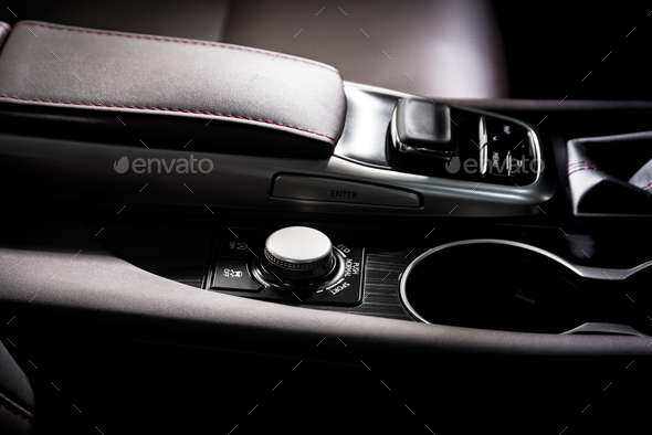 Media and navigation control buttons of a Modern car - Stock Photo - Images