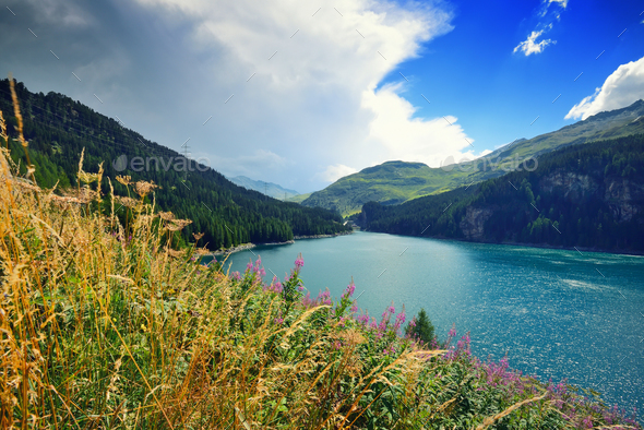 Beautiful view of the emerald alpine lake. Dramatic and pictures - Stock Photo - Images