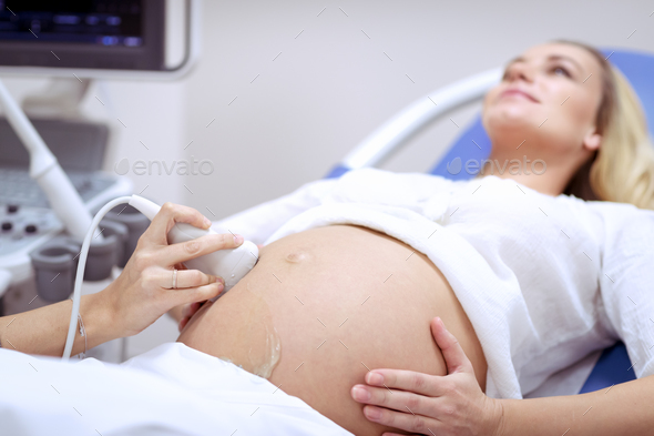 Pregnant woman on ultrasound Stock Photo by Anna_Om | PhotoDune