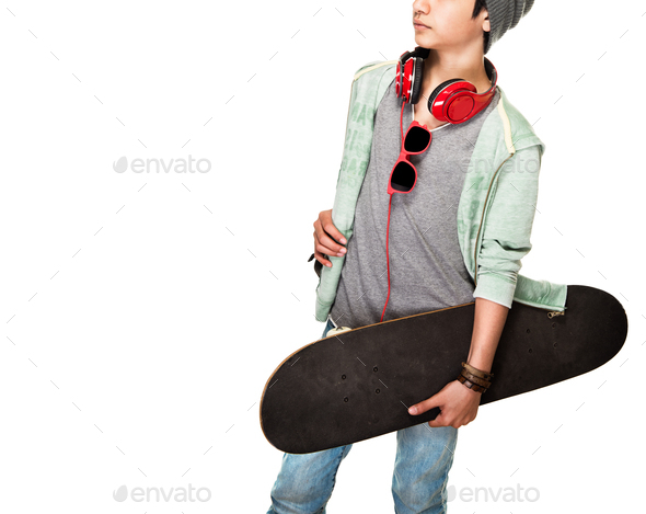 Skateboarder over white background - Stock Photo - Images