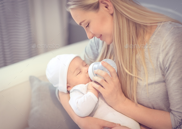 mother feeding baby