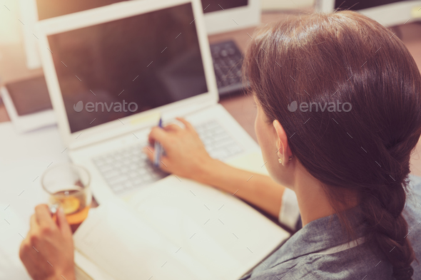 Smart female at work - Stock Photo - Images