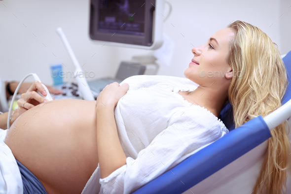 Pregnant woman on ultrasound Stock Photo by Anna_Om | PhotoDune
