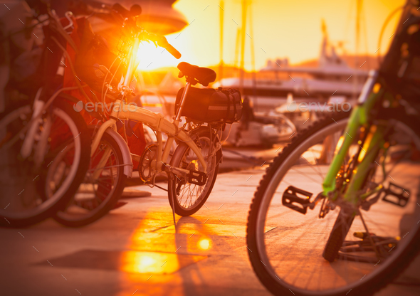 Bicycles in sunset light - Stock Photo - Images