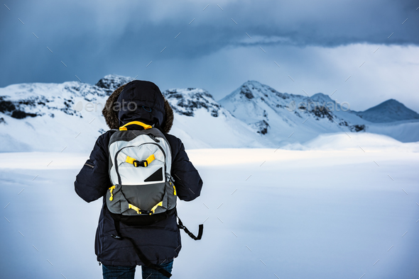 Traveler enjoying winter landscape - Stock Photo - Images