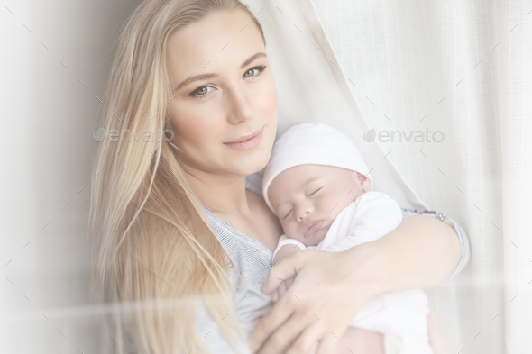 Happy mother with a baby - Stock Photo - Images