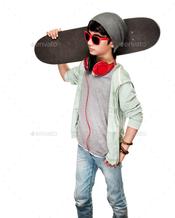 Teen boy with skateboard - Stock Photo - Images