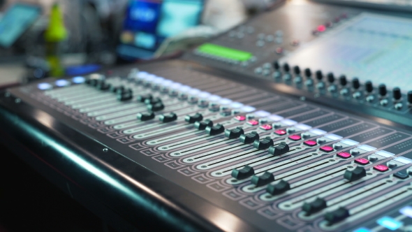 Audio Mixer in a Studio Automatic Knobs Moving Up, Stock Footage