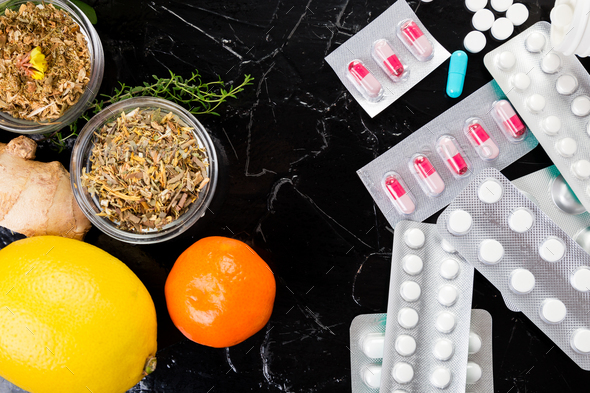 Natural medicine vs conventional medicine concept. - Stock Photo - Images
