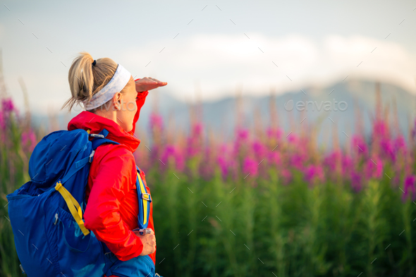 Woman hiking in mountains, adventure and travel Stock Photo by blas