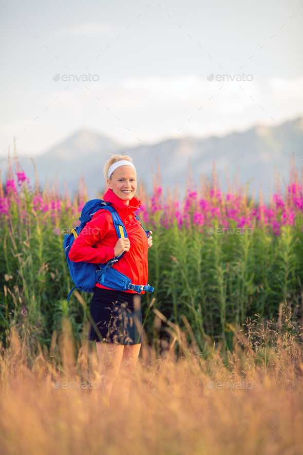 Woman hiking in mountains, adventure and travel - Stock Photo - Images