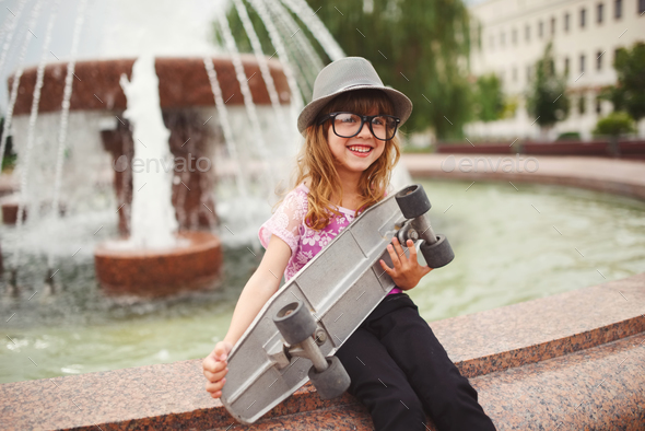little hipster girl with big glasses - Stock Photo - Images