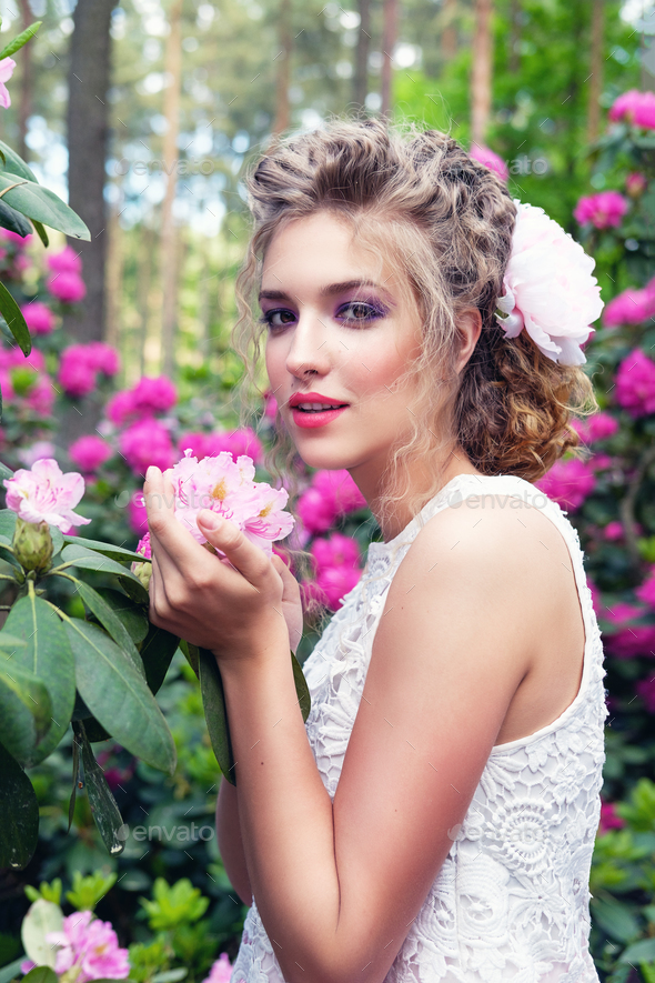 girl in dress in rhododendron garden Stock Photo by Svetography | PhotoDune