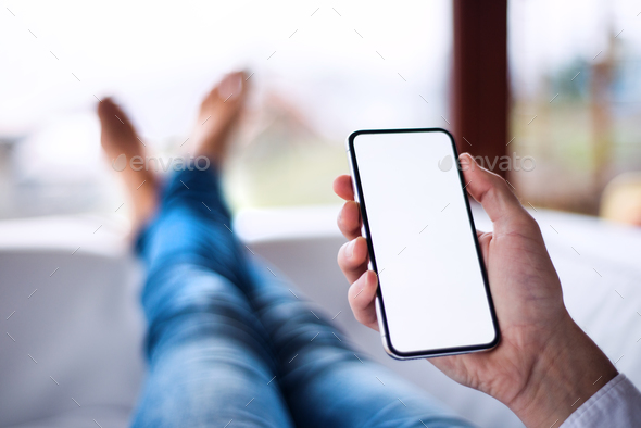 Mockup image of smartphone with blank white screen. Stock Photo by halfpoint