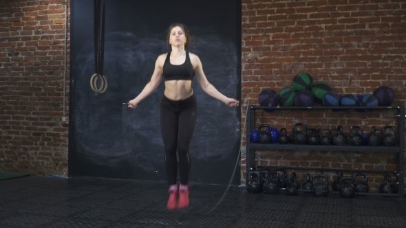 Fitness Woman Doing Double Jumping Rope in Cross Fit Gym