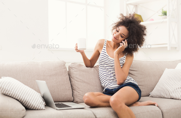 Beautiful freelancer working at home - Stock Photo - Images