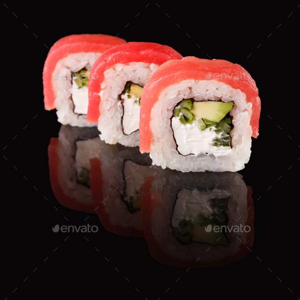 Japanese rolls on black mirroring background - Stock Photo - Images