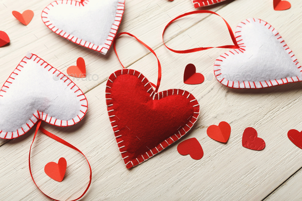 Valentine day background, handmade pillow hearts on wood, copy space - Stock Photo - Images