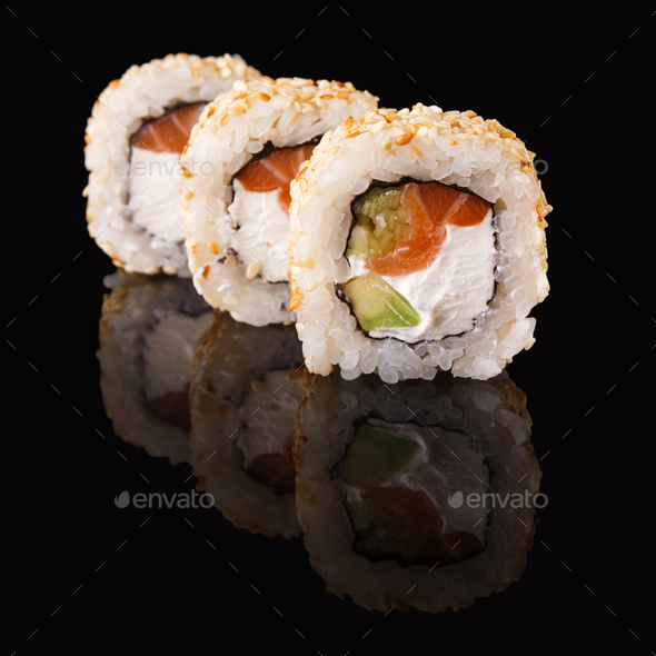Japanese rolls on black mirroring background - Stock Photo - Images