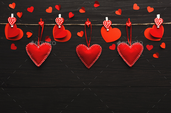 Valentine day background, pillow hearts border on wood, copy space - Stock Photo - Images