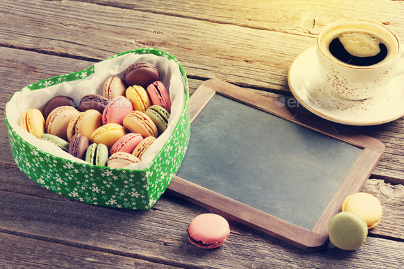 Colorful macaroons in Valentines day heart box - Stock Photo - Images