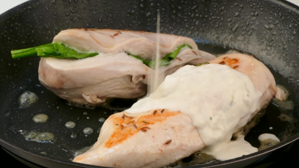 Roasted Chicken Fillet Is Poured Into the Sauce